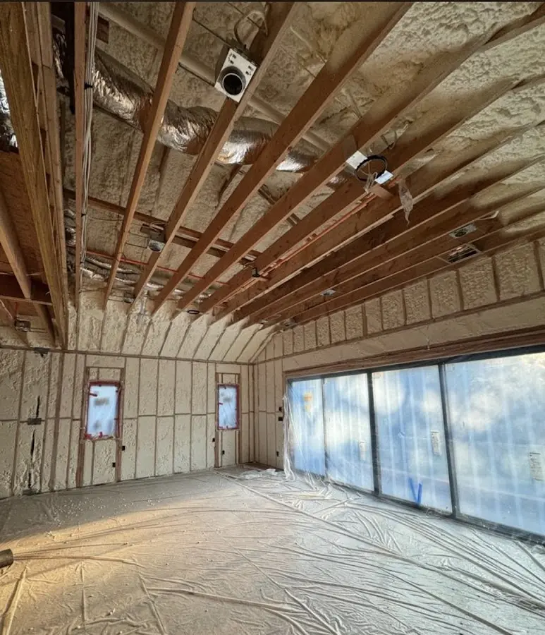 Interior walls and ceiling insulated with spray foam during new construction in Schuylkill